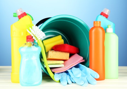 Technician handling carpet cleaning products with care