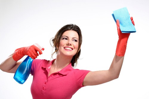 Carpet cleaning process in Chelsea home with furniture moved aside